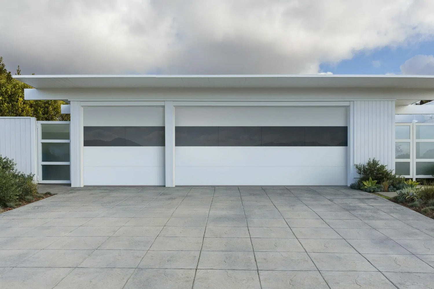 CHI Contemporary Sterling Insulated Modern Garage Doors with 2 row glass in Bone White