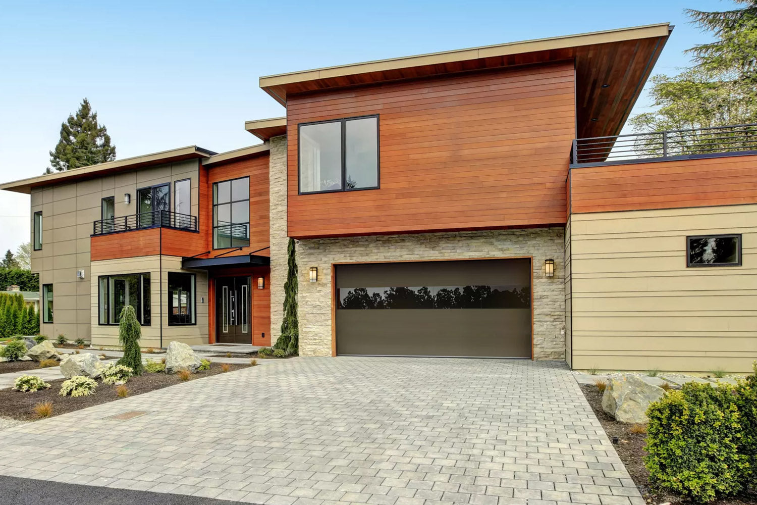 CHI Contemporary Sterling Insulated Modern Garage Doors with 2 row glass in Medium Bronze