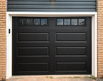 CHI Timeless Raised Panel Insulated Modern Garage Doors with Glass in Black