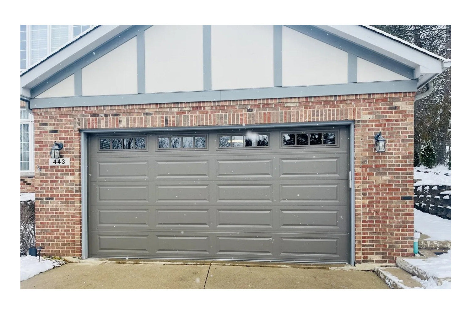CHI Timeless Raised Panel Insulated Modern Garage Doors with Glass in Bronze
