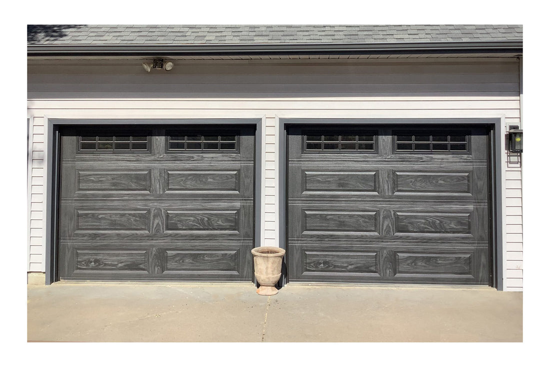 CHI Timeless Raised Panel Insulated Modern Garage Doors with Glass in Woodtone Carbon Oak