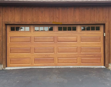 CHI Timeless Raised Panel Insulated Modern Garage Doors with Glass in Woodtone Cedar