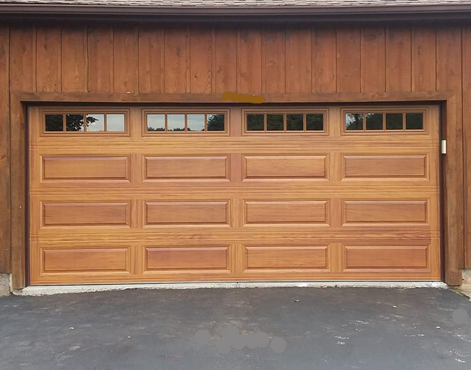 CHI Timeless Raised Panel Insulated Modern Garage Doors with Glass in Woodtone Cedar