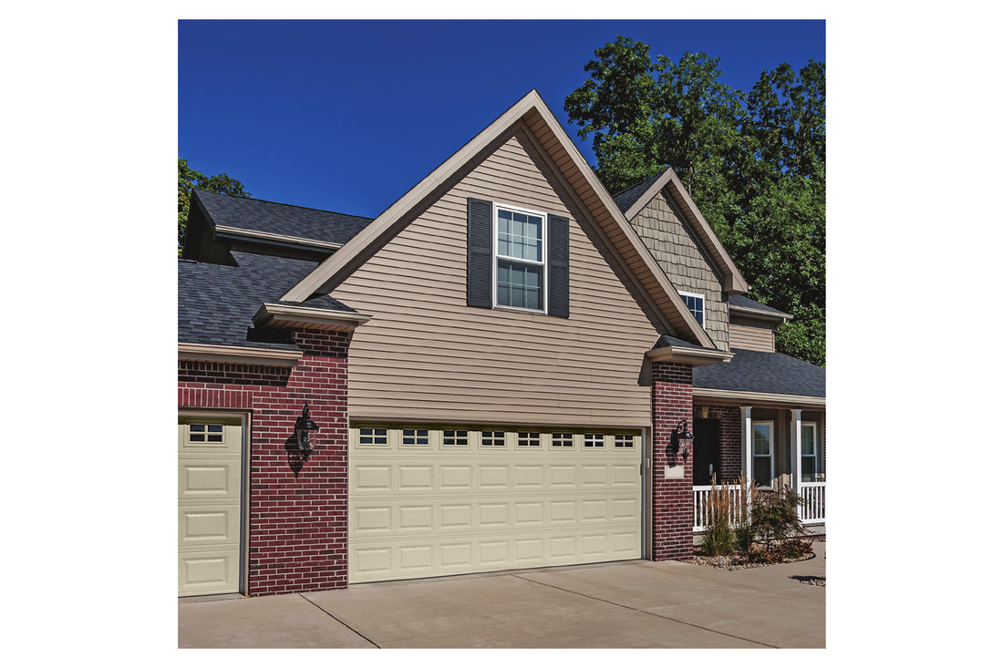 CHI Timeless Raised Panel Insulated Modern Garage Doors with Glass in Desert Tan