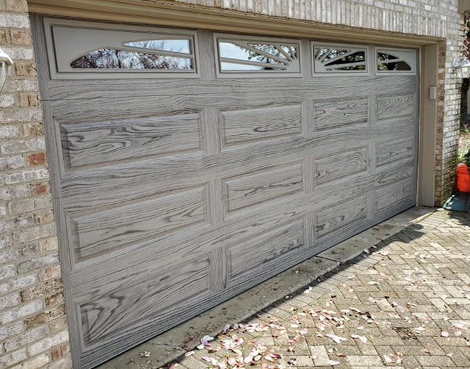 CHI Timeless Raised Panel Insulated Modern Garage Doors with Glass in Woodtone Driftwood