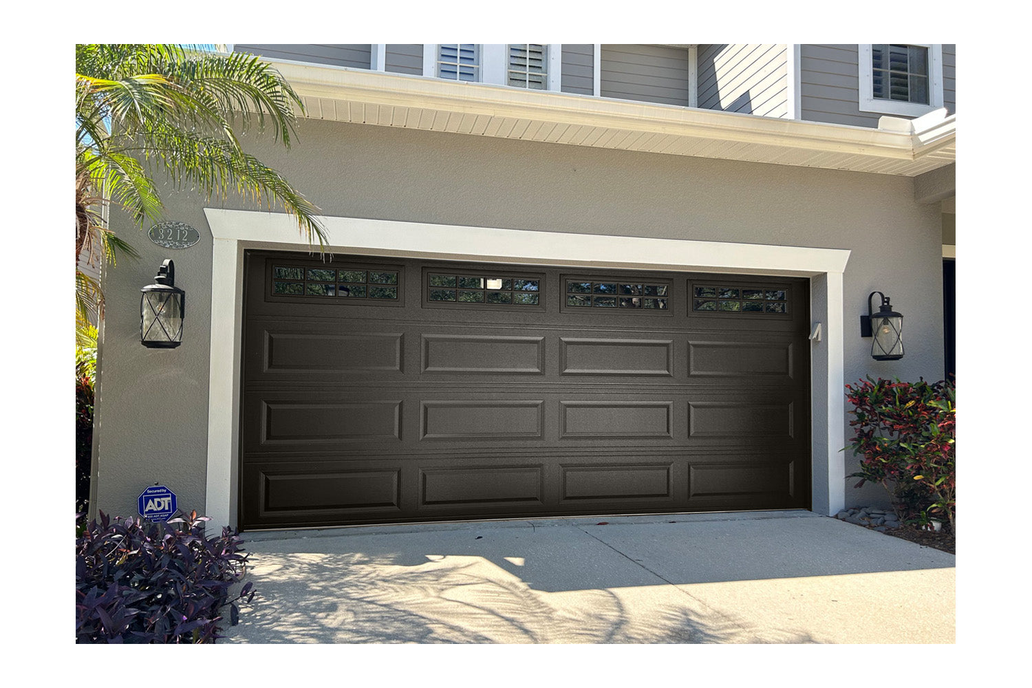 CHI Timeless Raised Panel Insulated Modern Garage Doors with Glass in Powder Coated Mocha Brown