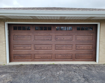 CHI Timeless Raised Panel Insulated Modern Garage Doors with Glass in Woodtone Walnut