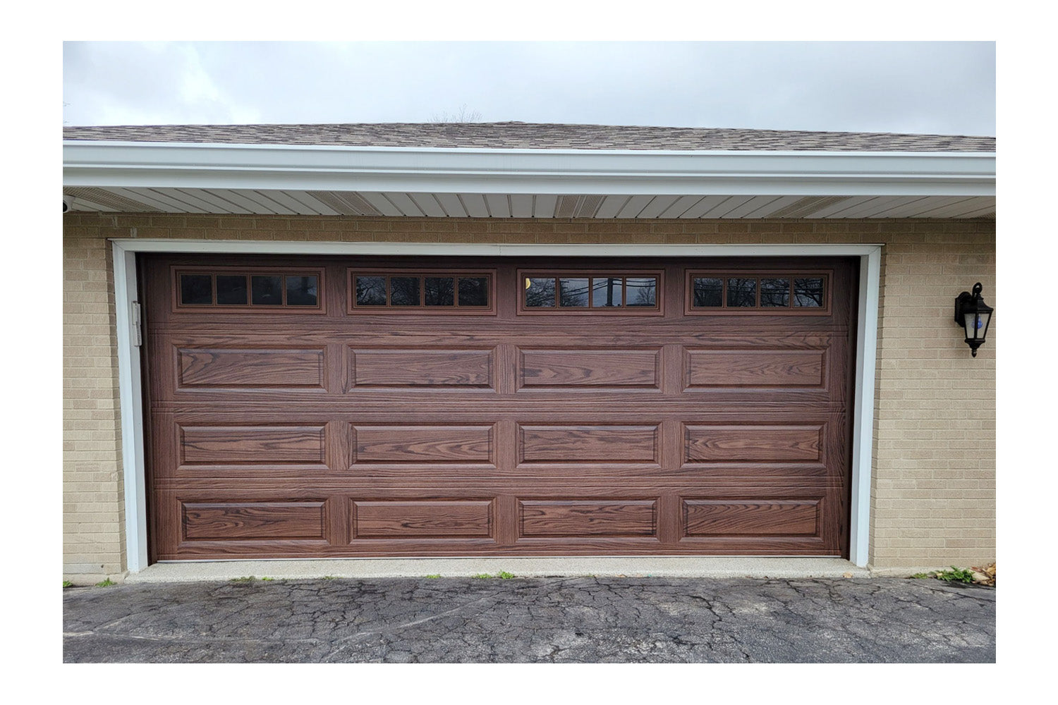 CHI Timeless Raised Panel Insulated Modern Garage Doors with Glass in Woodtone Walnut