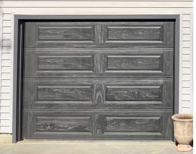 CHI Timeless Raised Panel Insulated Modern Garage Doors in Woodtone Carbon Oak