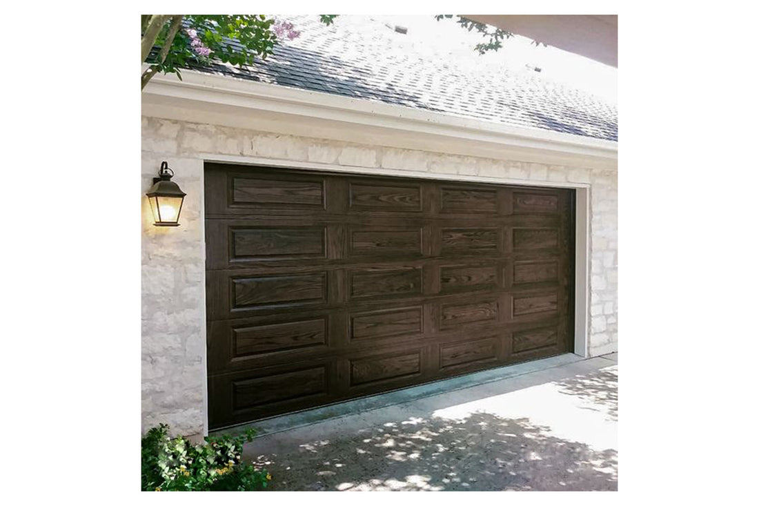 CHI Timeless Raised Panel Insulated Modern Garage Doors in Woodtone Dark Oak