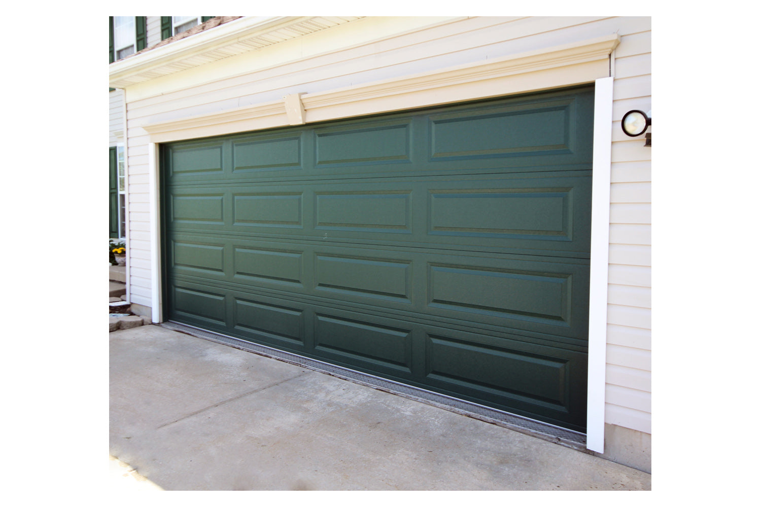 CHI Timeless Raised Panel Insulated Modern Garage Doors in Powder Coated Evergreen