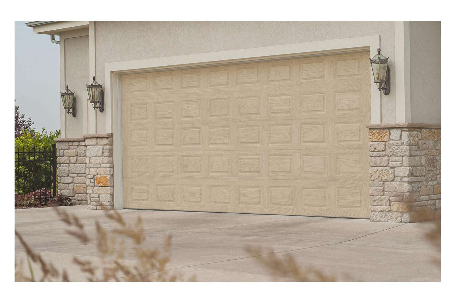 CHI Timeless Raised Panel Insulated Modern Garage Doors in Woodtone Natural Oak