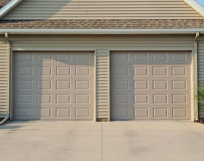 CHI Timeless Raised Panel Insulated Modern Garage Doors in Sandstone