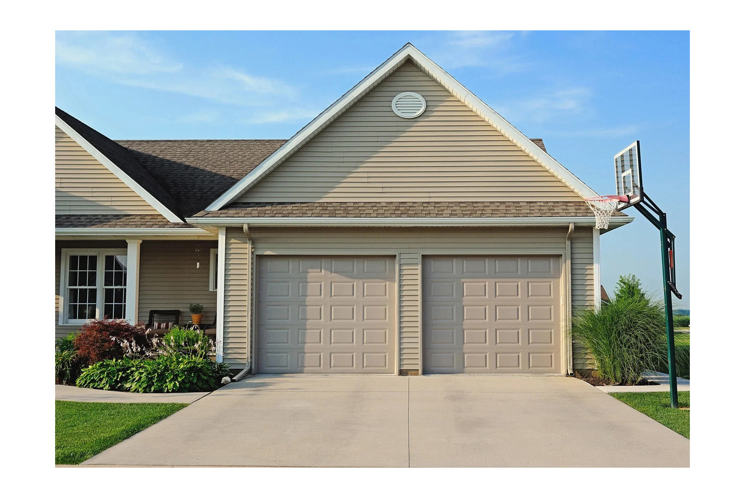 CHI Timeless Raised Panel Insulated Modern Garage Doors in Sandstone