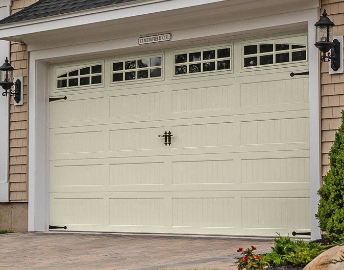 CHI Timeless Stamped Carriage House Insulated Modern Garage Doors with Glass in Almond