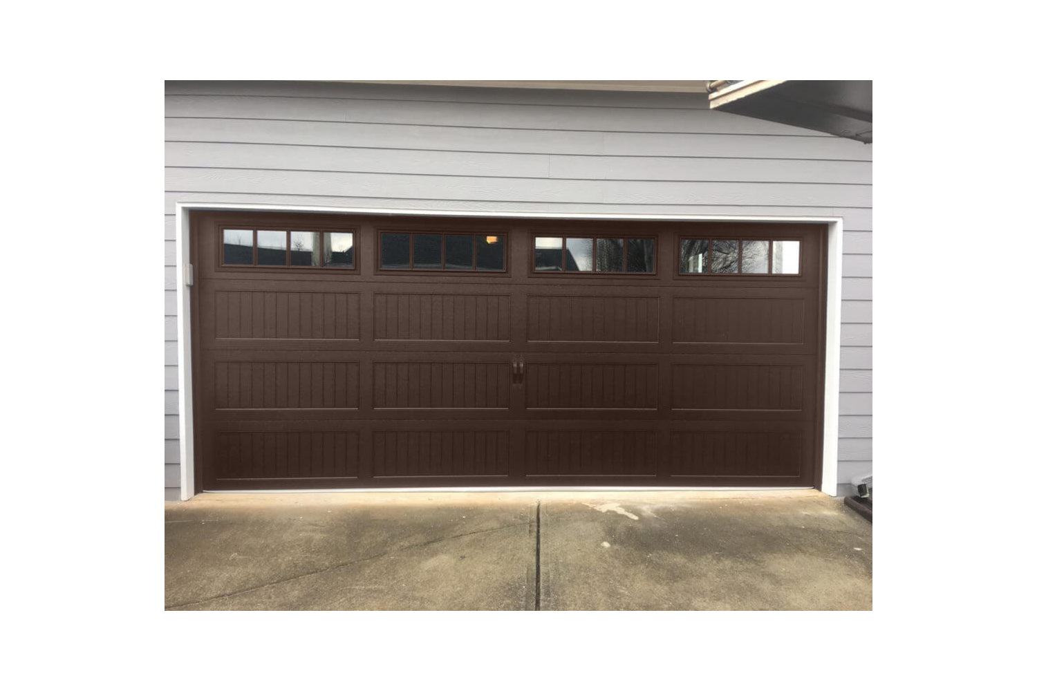 CHI Timeless Stamped Carriage House Insulated Modern Garage Doors with Glass in Brown