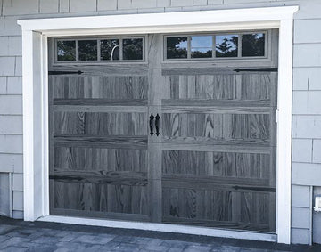 CHI Timeless Stamped Carriage House Insulated Modern Garage Doors with Glass in Woodtone Carbon Oak