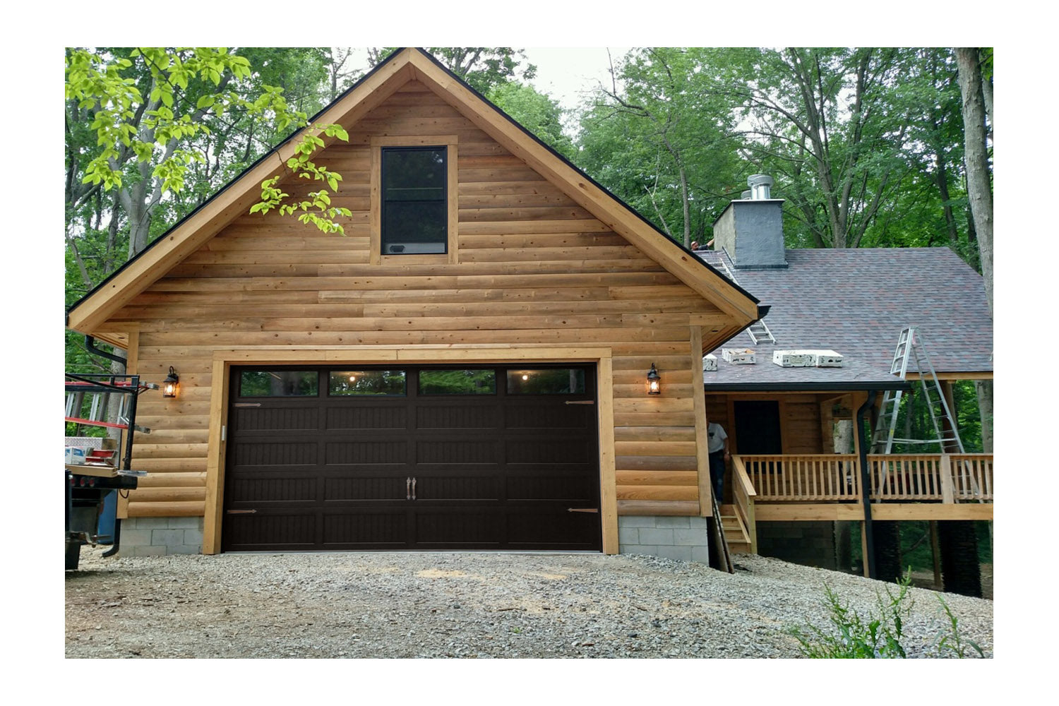 CHI Timeless Stamped Carriage House Insulated Modern Garage Doors with Glass in Powder Coated Dark Bronze