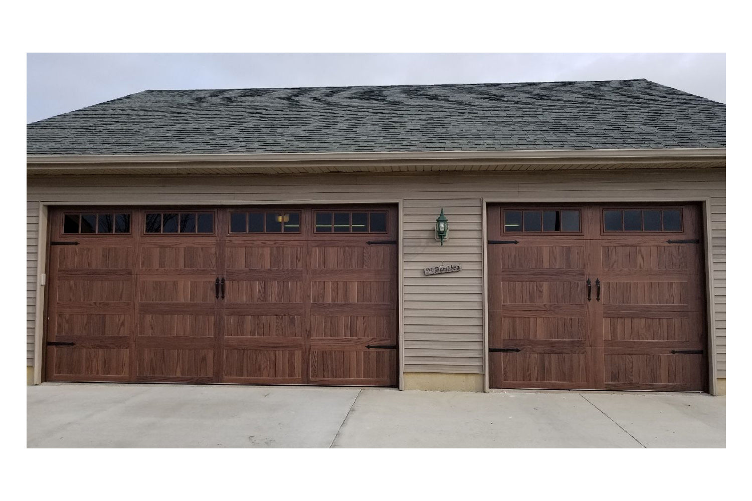 CHI Timeless Stamped Carriage House Insulated Modern Garage Doors with Glass in Woodtone Dark Oak