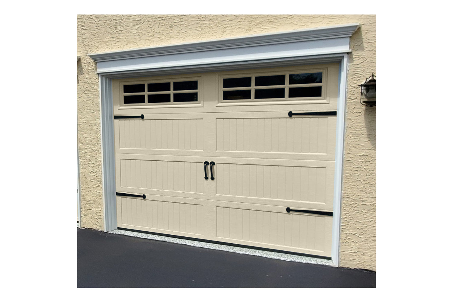 CHI Timeless Stamped Carriage House Insulated Modern Garage Doors with Glass in Desert Tan