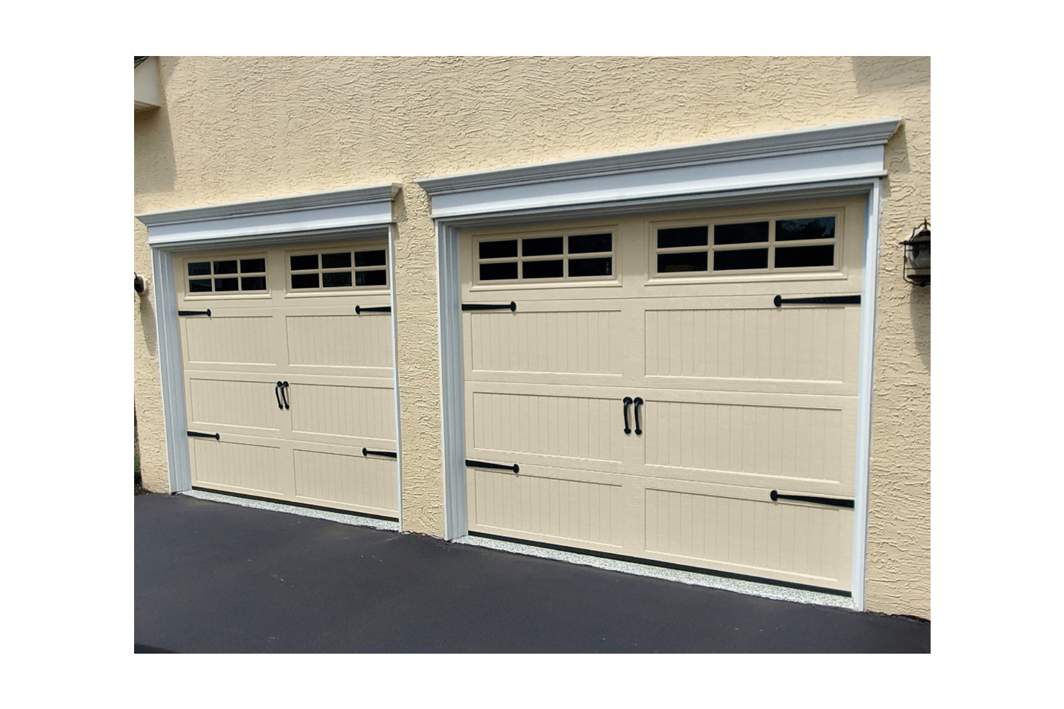 CHI Timeless Stamped Carriage House Insulated Modern Garage Doors with Glass in Desert Tan