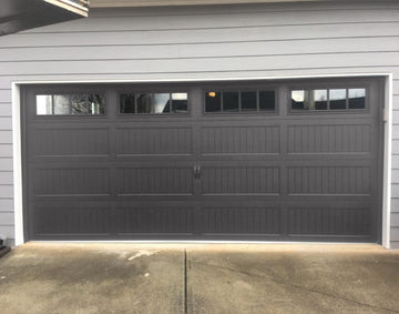 CHI Timeless Stamped Carriage House Insulated Modern Garage Doors with Glass in Graphite