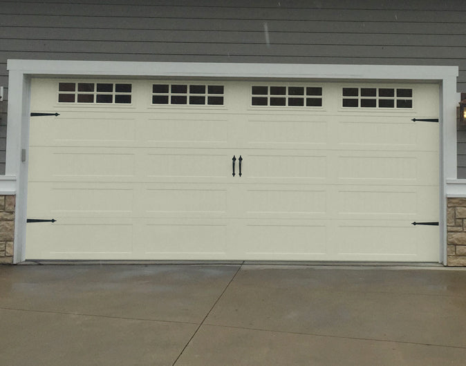 CHI Timeless Stamped Carriage House Insulated Modern Garage Doors with Glass in Powder Coated Ivory