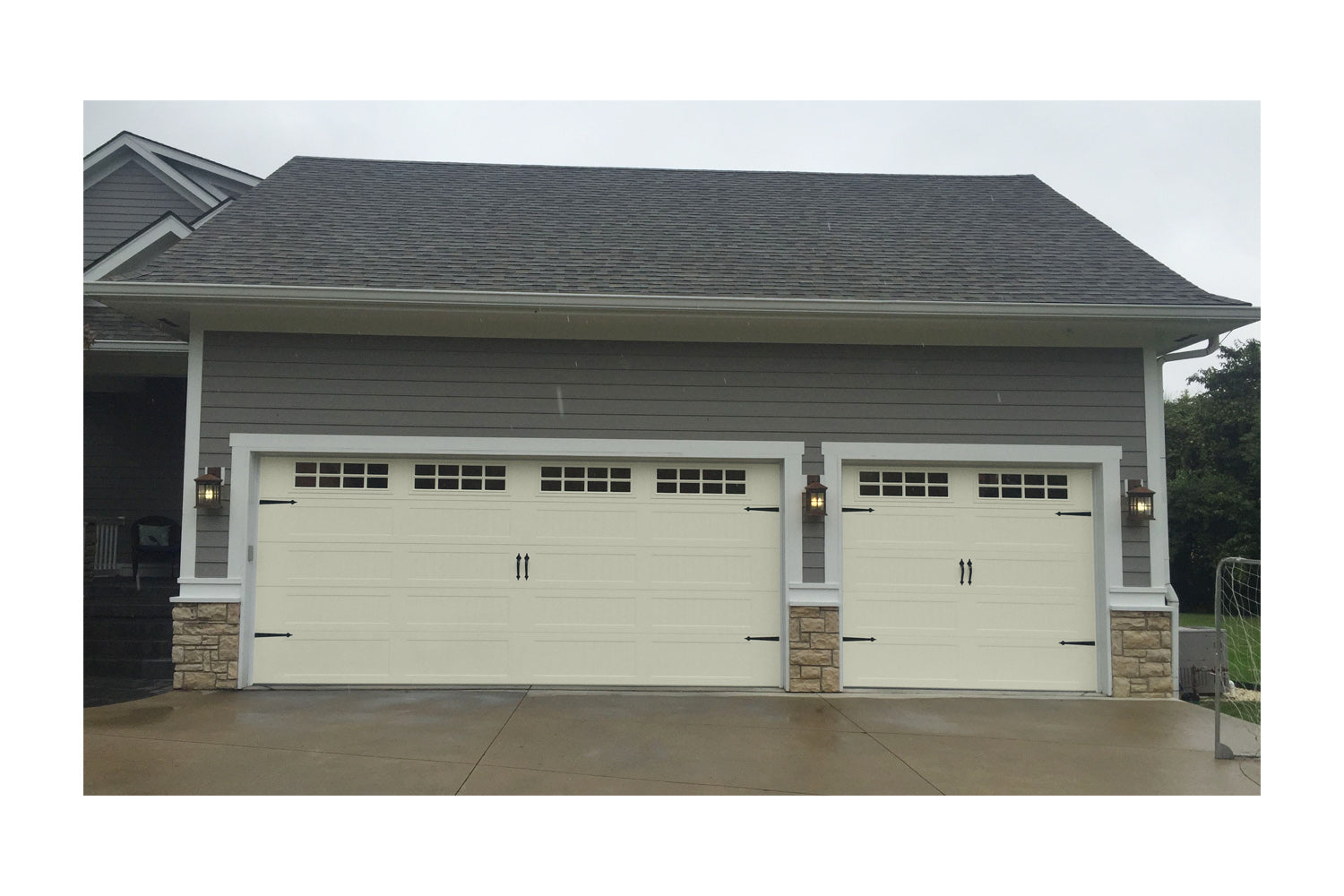 CHI Timeless Stamped Carriage House Insulated Modern Garage Doors with Glass in Powder Coated Ivory
