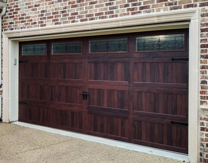 CHI Timeless Stamped Carriage House Insulated Modern Garage Doors with Glass in Woodtone Mahogany