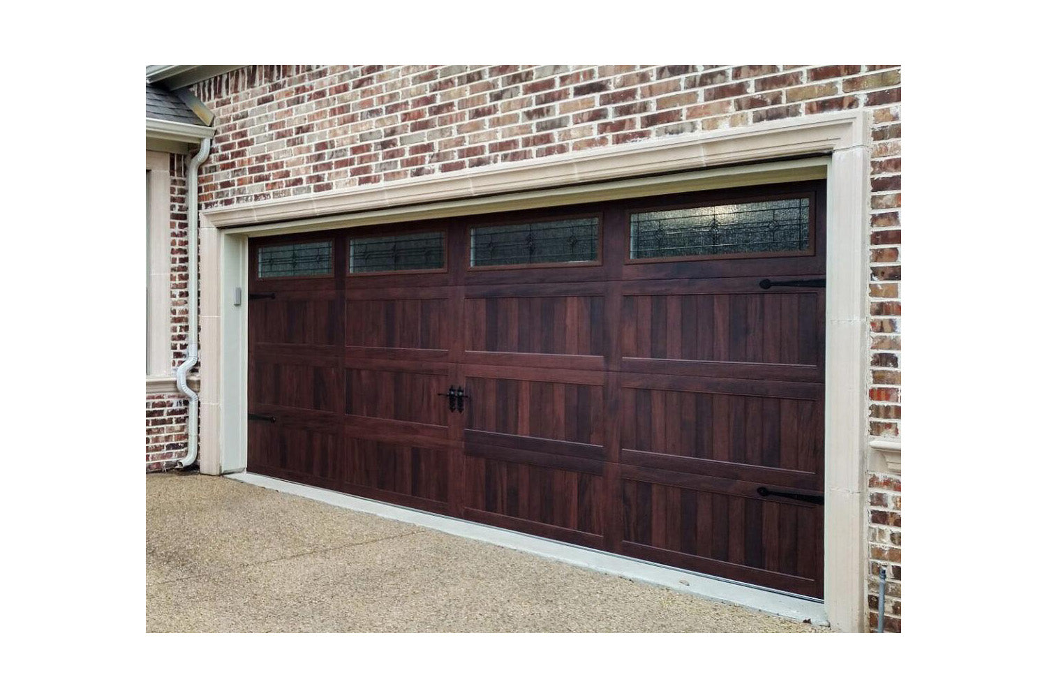 CHI Timeless Stamped Carriage House Insulated Modern Garage Doors with Glass in Woodtone Mahogany