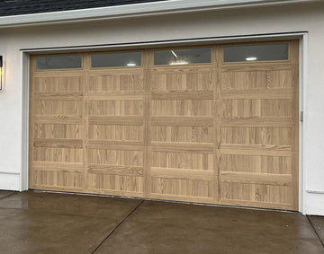 CHI Timeless Stamped Carriage House Insulated Modern Garage Doors with Glass in Woodtone Natural Oak