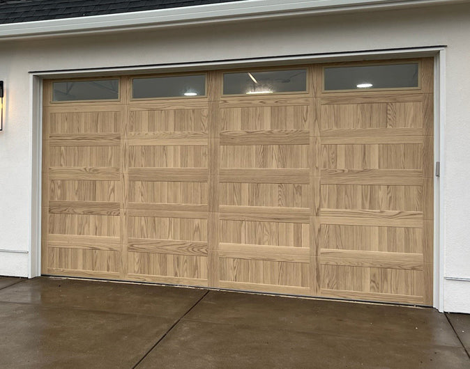 CHI Timeless Stamped Carriage House Insulated Modern Garage Doors with Glass in Woodtone Natural Oak