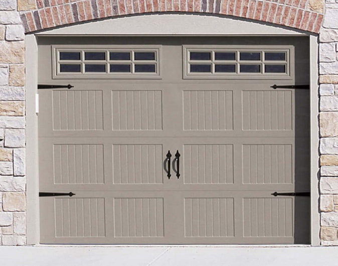 CHI Timeless Stamped Carriage House Insulated Modern Garage Doors with Glass in Sandstone