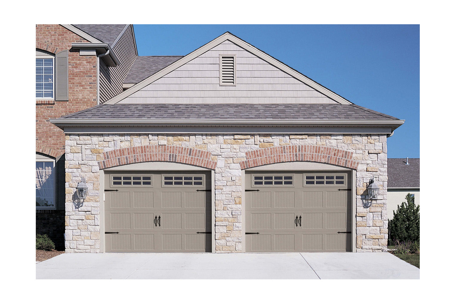 CHI Timeless Stamped Carriage House Insulated Modern Garage Doors with Glass in Sandstone