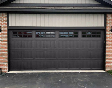 CHI Timeless Stamped Carriage House Insulated Modern Garage Doors with Glass in Powder Coated Solar Black