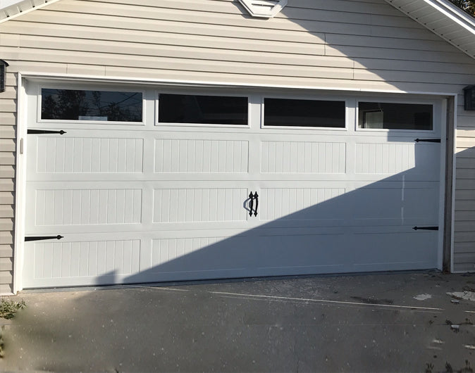 CHI Timeless Stamped Carriage House Insulated Modern Garage Doors with Glass in White