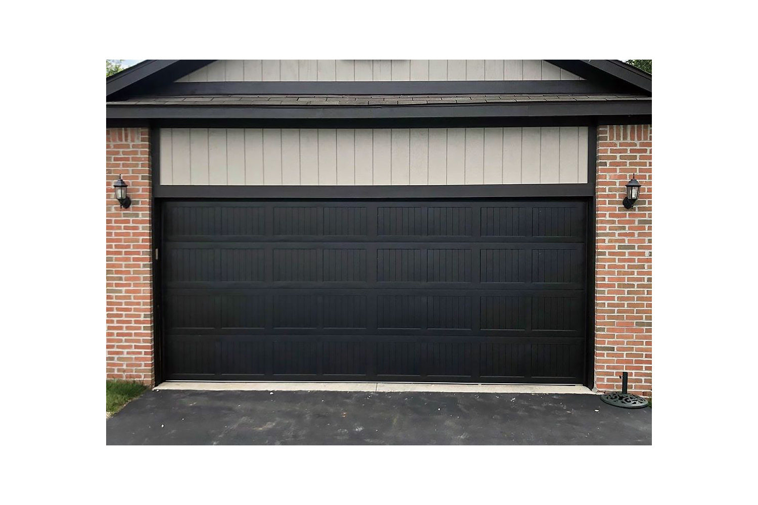 CHI Timeless Stamped Carriage House Insulated Modern Garage Doors in Black