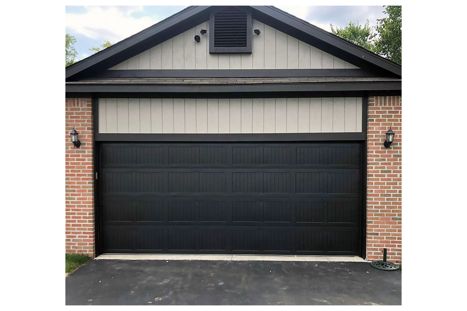 CHI Timeless Stamped Carriage House Insulated Modern Garage Doors in Black
