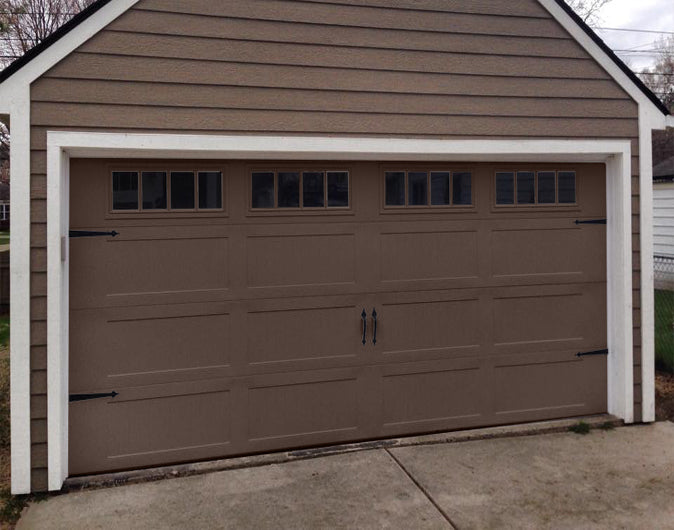 CHI Timeless Stamped Carriage House Insulated Modern Garage Doors in Brown