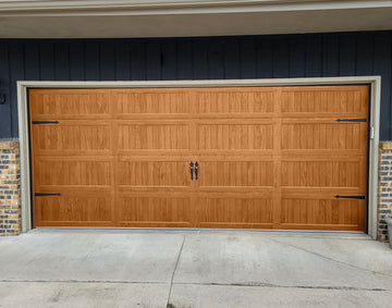 CHI Timeless Stamped Carriage House Insulated Modern Garage Doors in Woodtone Cedar