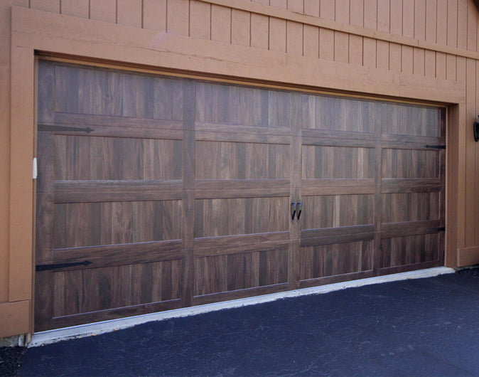CHI Timeless Stamped Carriage House Insulated Modern Garage Doors in Woodtone Dark Oak