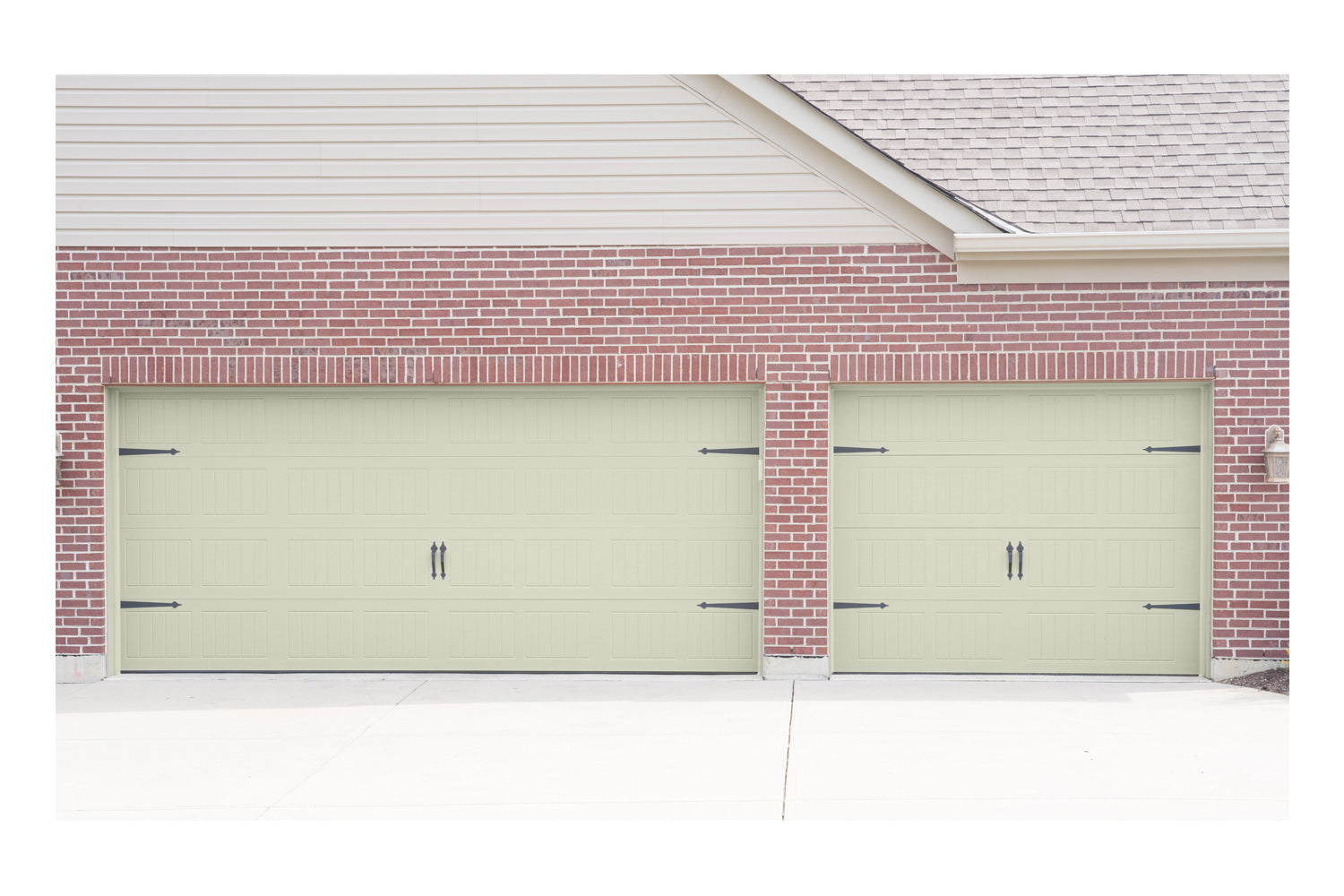 CHI Timeless Stamped Carriage House Insulated Modern Garage Doors in Powder Coated Ivory