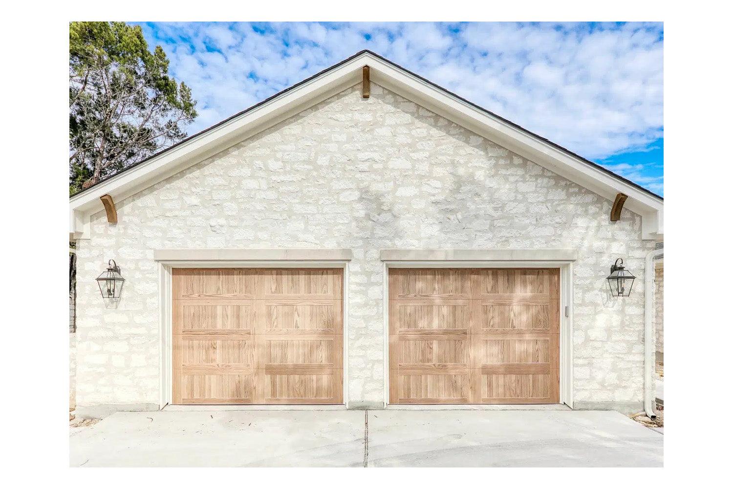CHI Timeless Stamped Carriage House Insulated Modern Garage Doors in Woodtone Natural Oak