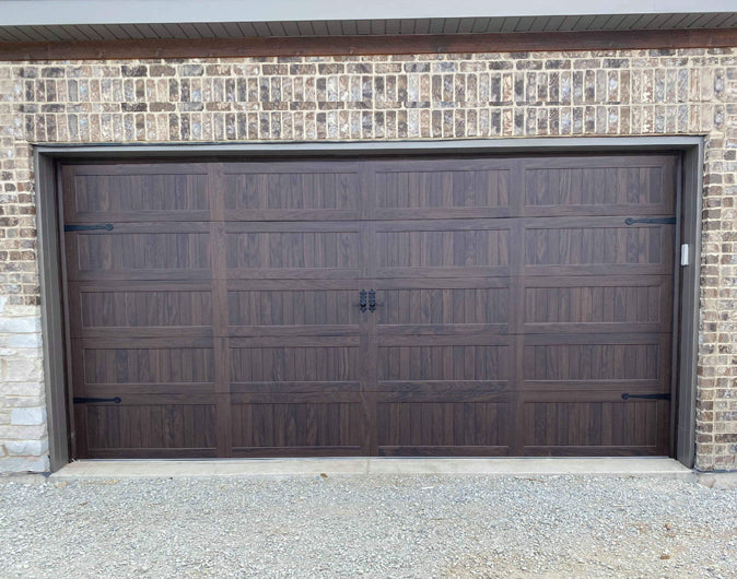 CHI Timeless Stamped Carriage House Insulated Modern Garage Doors in Woodtone Walnut