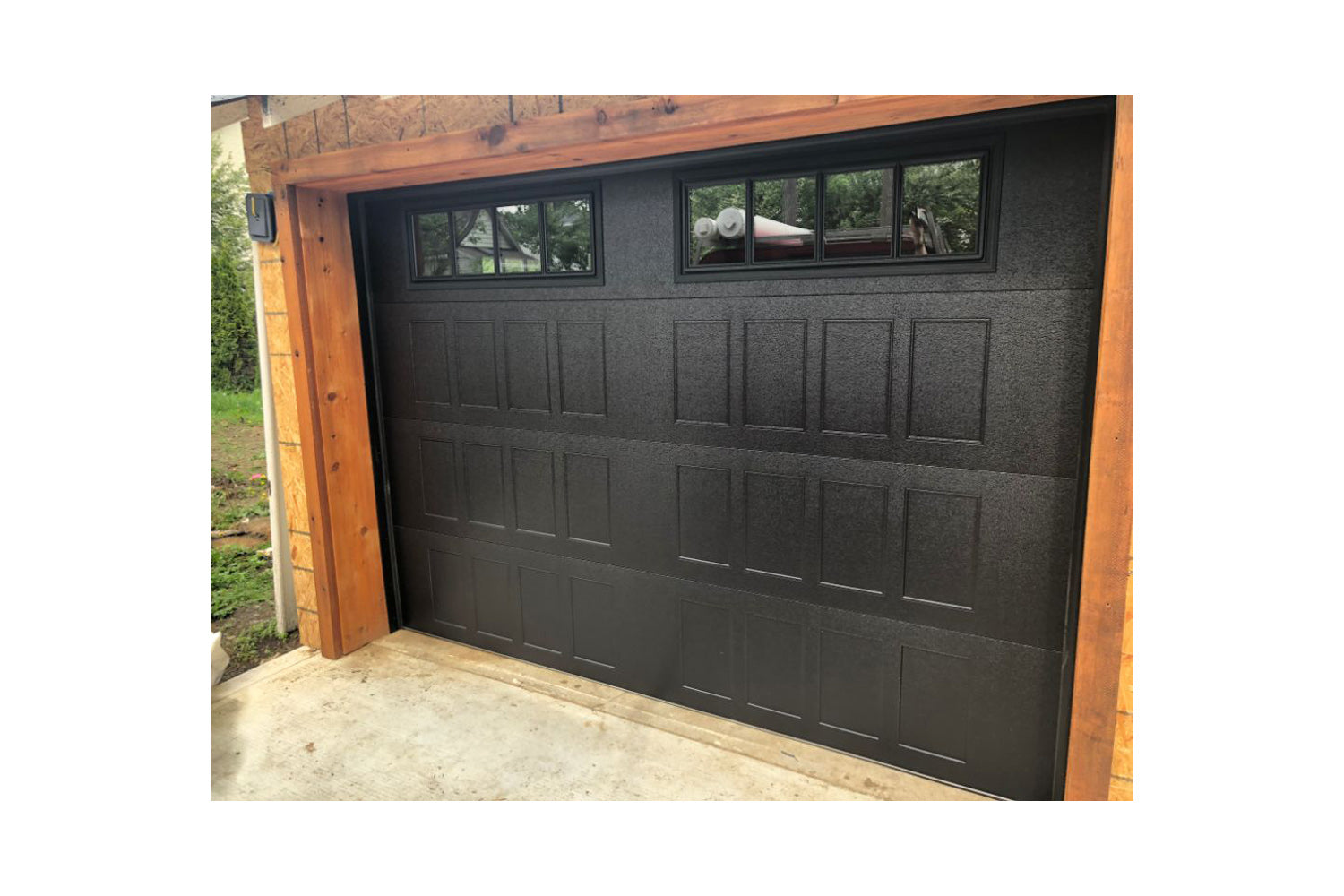 CHI Timeless Stamped Shaker Insulated Modern Garage Doors with Glass in Black