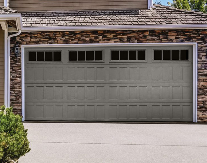 CHI Timeless Stamped Shaker Insulated Modern Garage Doors with Glass in Bronze