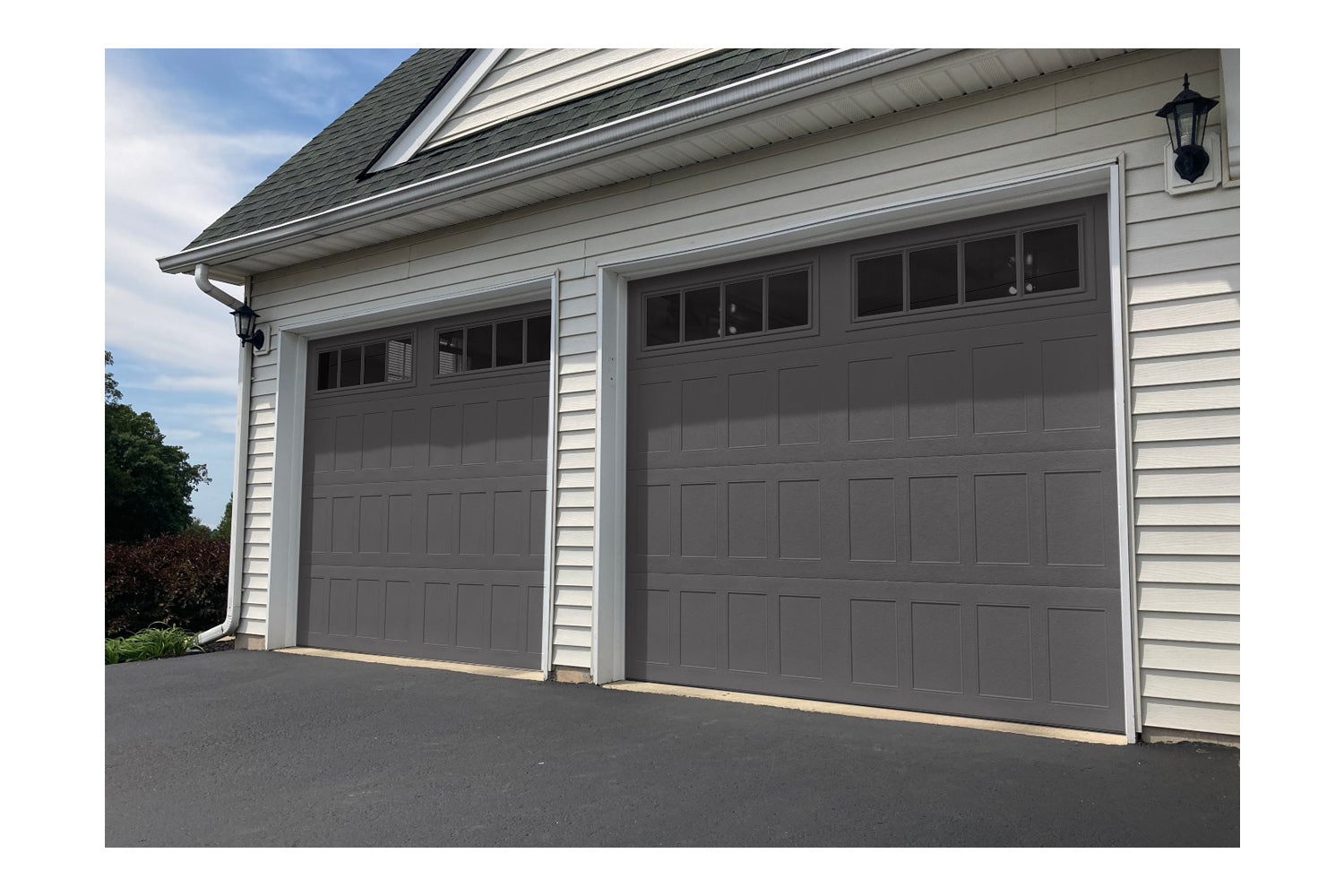 CHI Timeless Stamped Shaker Insulated Modern Garage Doors with Glass in Graphite