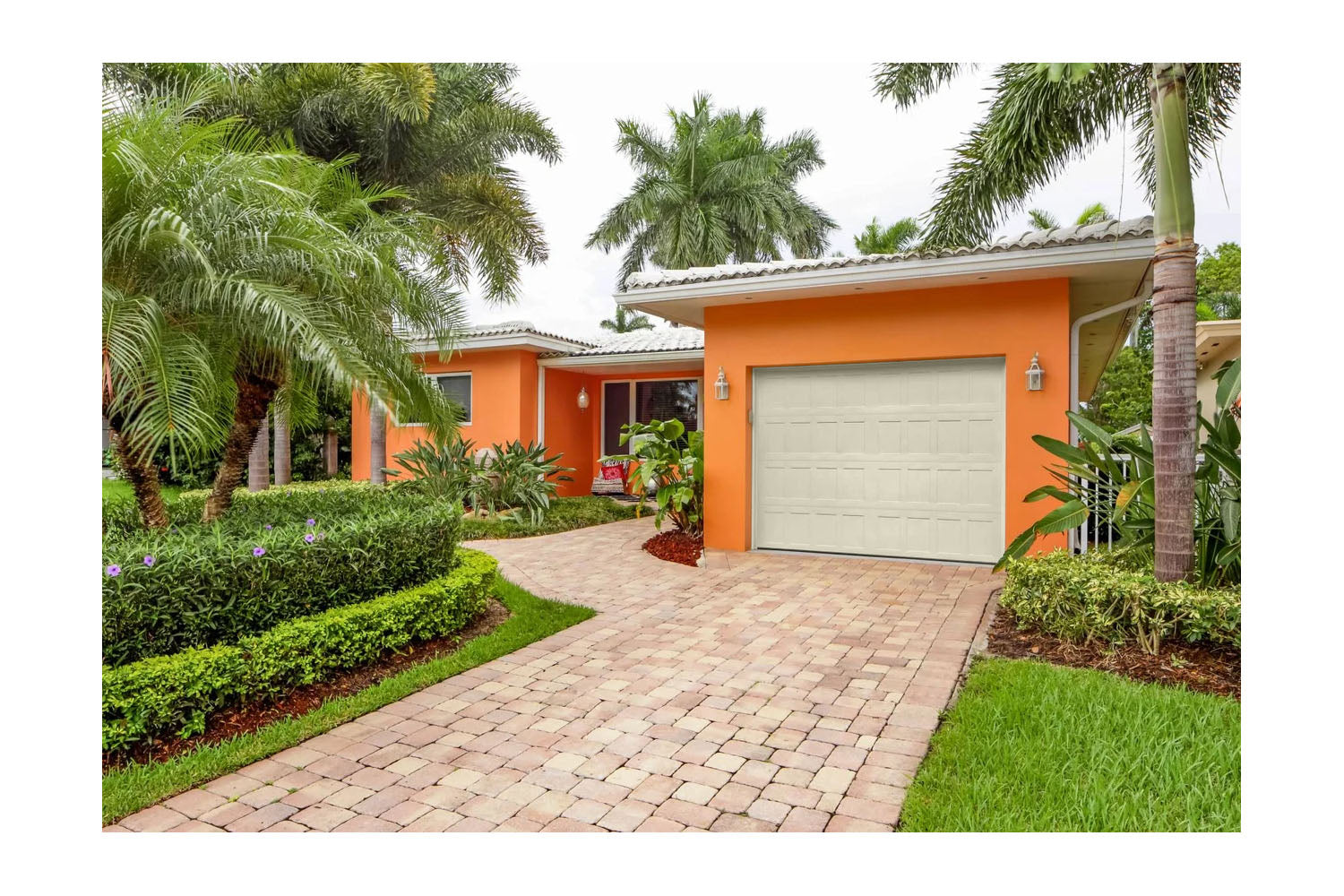 CHI Timeless Stamped Shaker Insulated Modern Garage Doors in Almond