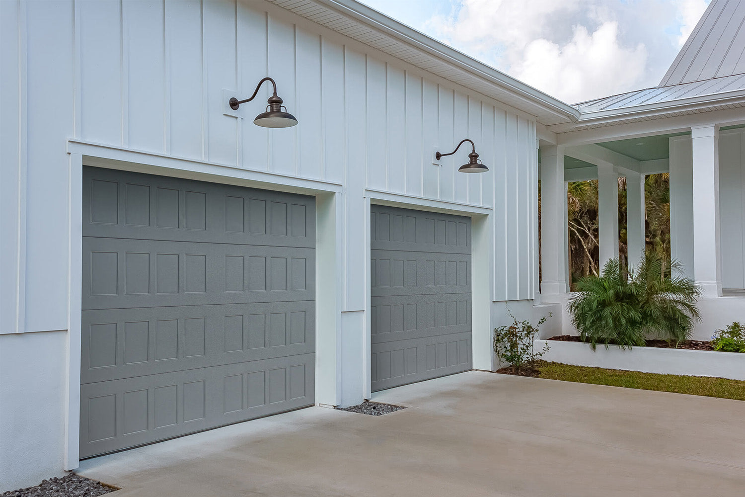 CHI Timeless Stamped Shaker Insulated Modern Garage Doors in Gray