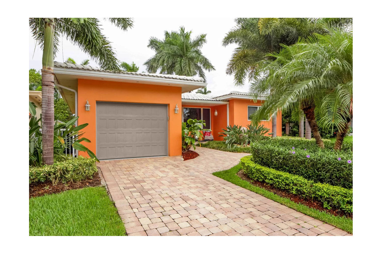 CHI Timeless Stamped Shaker Insulated Modern Garage Doors in Sandstone